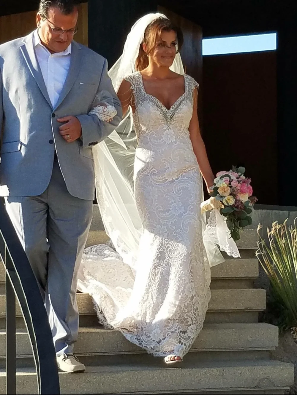 Elegant White Lace Bridal Gown with Beaded Straps